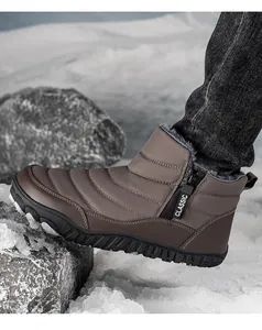 Close-up of brown winter snow boot with fleece lining and side zipper on outdoor snow