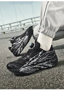 Outdoor close-up of breathable mesh running shoes with rotary dial lacing system