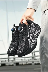 Detail of black running shoes featuring a quick-lace dial system and breathable mesh fabric