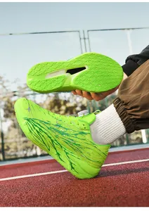 Detail of neon green running shoes with breathable mesh and quick-adjustment swivel dial