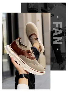 Dettaglio di sneaker in maglia stile brogue con sovrapposizioni in pelle marrone