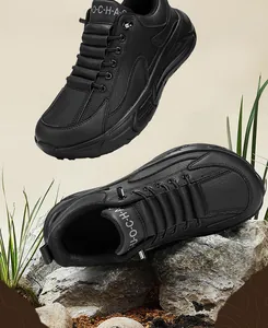 Close-up of black leather barefoot running shoes with thick cushioned sole and unique lacing