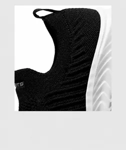 Detail van ademend gebreid bovenwerk en zachte binnenvoering voor sportschoenen