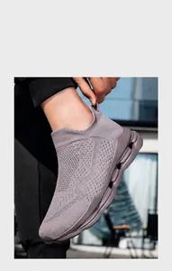 Detail showing breathable mesh upper and hollow cushioning sole of mauve walking shoe