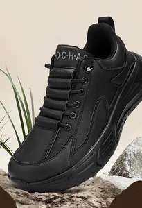 Detailed side view of black leather barefoot shoes with anti-slip rubber outsoles