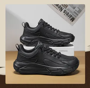 Close-up of black leather barefoot sneakers with textured surface and wavy thick soles
