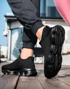 Close-up of lightweight slip-on walking shoes with breathable knit and cushioned soles