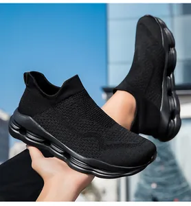 Detail of black knit sock shoes featuring breathable mesh and flexible shock-absorbing soles