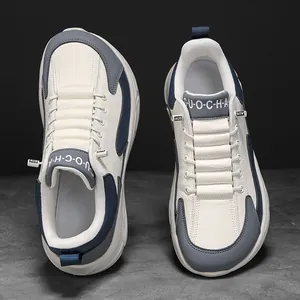 Men's minimalist off-white leather sports sneakers with grey and navy stitching accents