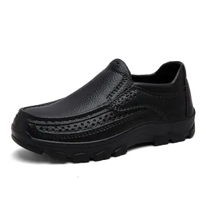 Classic black slip-on leather shoes with breathable perforations and anti-slip rubber soles