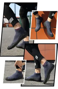 Macro detail of navy mesh barefoot shoes with high-traction rubber soles and sport text