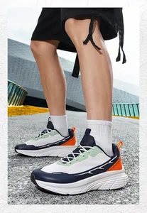 Detailed side view of breathable wide-toe sneakers with thick cushioned soles on model