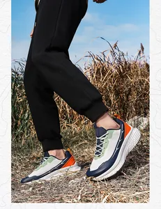 Outdoor walk showing breathable mesh sneakers with thick white soles on grassy terrain