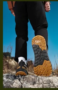 Detailed view of wide-toe platform sneakers with deep anti-slip rubber outsoles for hiking