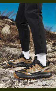 Outdoor view of lightweight chunky hiking sneakers with shock-absorbing thick soles