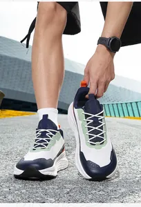 Close-up of wide toe men's mesh sneakers with thick cushioned soles for high breathability