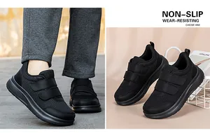 Dettaglio di scarpe da camminata nere con tomaia in mesh traspirante e cinturini in Velcro