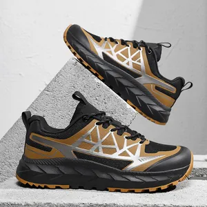 Outdoor hiking shoes with black mesh, brown leather trim and thick cushioning soles