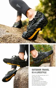 Detail of olive green trekking shoes with thick rubber outsoles and anti-slip yellow studs