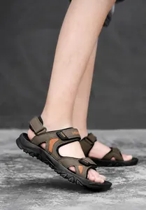 Detail of army green sports sandals with adjustable straps and non-slip rubber soles