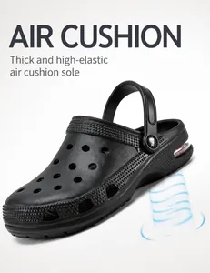 Detail view of the shock-absorbing air cushion and high-elastic sole of black clogs