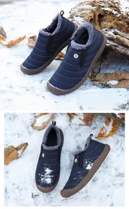Close-up of waterproof navy winter snow boots with warm faux fur lining and anti-slip rubber sole