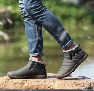 Outdoor walk showing grey waterproof snow boots with quilted fabric and warm faux fur lining