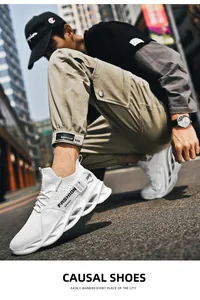 Detail view of white breathable mesh sneakers with hollow blade soles and fashion text