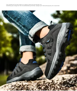 Outdoor hiking shoes with pigskin leather and mesh detail shown on rocky terrain