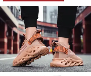 Close-up of brown knit running shoes showing hollow cushioning sole and heel pull tab