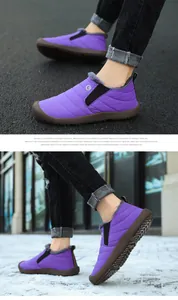 Detail of purple waterproof winter snow boots with plush lining and anti-slip rubber sole