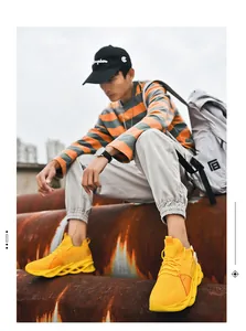 Detail view of bright yellow breathable blade sneakers with hollow shock-absorbing sole