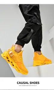 Detail of breathable yellow blade sneakers featuring hollow wave soles and fashion straps
