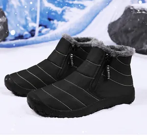 Detail of winter snow boot with thick grey faux fur lining and side zipper closure