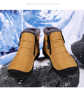 Waterproof snow boot with side zipper, warm grey faux fur lining, and non-slip sole