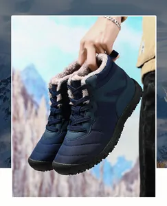 Close-up of waterproof winter snow boot showing thick faux fleece lining and navy blue quilted nylon