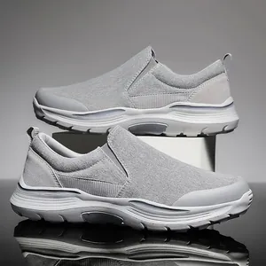 Chaussures en toile grise sans lacets pour hommes avec semelle blanche et mesh aéré