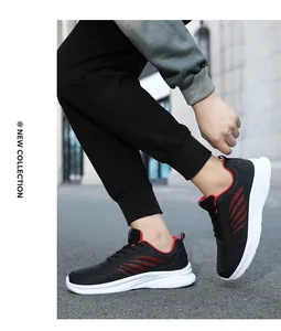Nahaufnahme schwarzer Leder-Sneaker mit roten Wellendetails und dicker weißer Dämpfungssohle