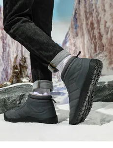 Close-up of waterproof snow boots featuring thick plush lining and anti-slip rubber sole