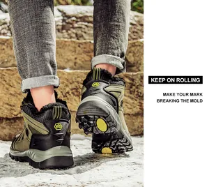 Detail of high-top winter hiking boots showing durable rubber soles and warm fleece lining