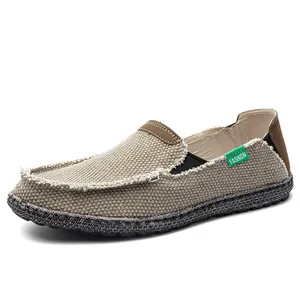 Mens casual canvas loafers with frayed edges and speckled rubber soles in beige
