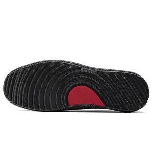 Schwarze Canvas-Loafer-Sohle mit rotem Akzent und rutschfestem Gummiprofil