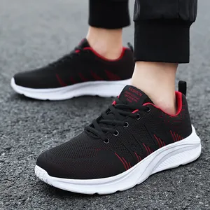 Men's breathable mesh running shoes in black and red with thick white cushioned soles