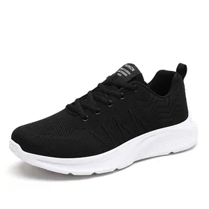 Men's breathable flyknit sneakers in black and white with thick slip-resistant sole