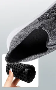 Macro shot showing the flexible honeycomb breathable insole and soft knit of the running shoe