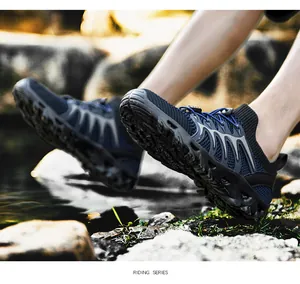 Outdoor river shoes for men featuring breathable mesh and durable grip sole on river rocks