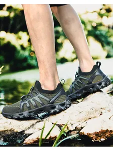 Close-up of olive green breathable mesh hiking shoes with quick-lace system and grippy sole