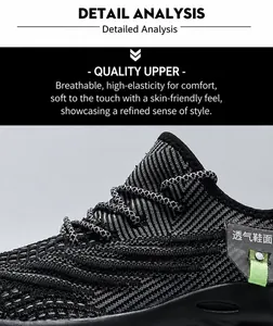 Gros plan sur la maille respirante et l'étiquette décorative des baskets de sport sombres