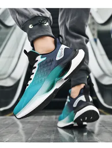 Close-up of men's breathable running shoes with blue gradient mesh and cushioned thick soles