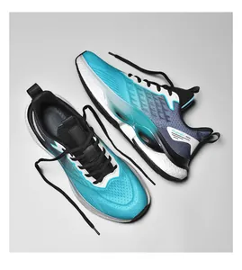 Close-up of lightweight breathable mesh sneakers with gradient texture and foam sole